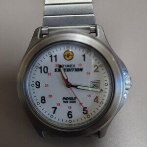 Timex watch with Indiglo, steel expansion band in like-new condition